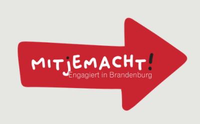 Ein roter Pfeil mit der Aufschrift Mitjemacht. Engagiert in Brandenburg